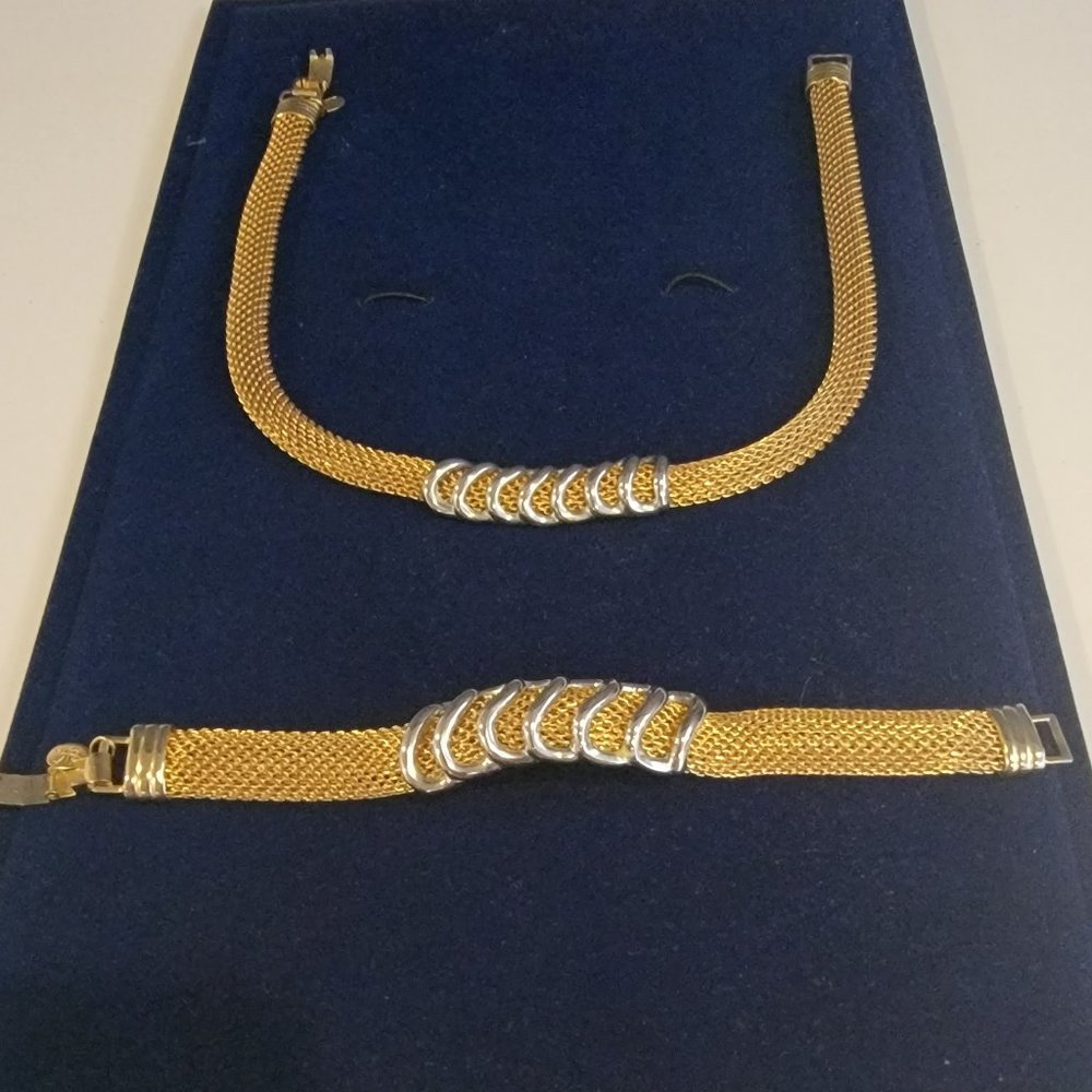 Elevate Your Style with this DVF Gold and Silver Tone Mesh Necklace and Bracelet